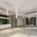 走入建築大廳，漣漪造型的曲面湖頂串連映入眼簾，彷彿反重力一般的漣漪水滴，弧形曲面的造型天花，讓整個空間昇華成一件藝術精品。