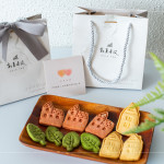 伴手禮贈(zèng)送『迦南園烘焙庇護(hù)工場』的公益餅乾，可愛、溫馨兼顧著美味，為這場活動(dòng)增添一份愛的溫度。